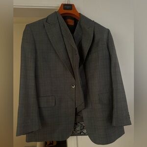 This is a 3 piece statement suit with a jacket, pants and vest.